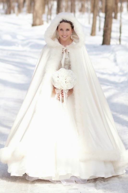 novia invierno con capa